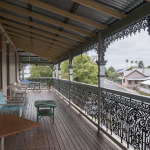 Wrought iron Federation railings upper balcony at The Ulmarra Hotel.