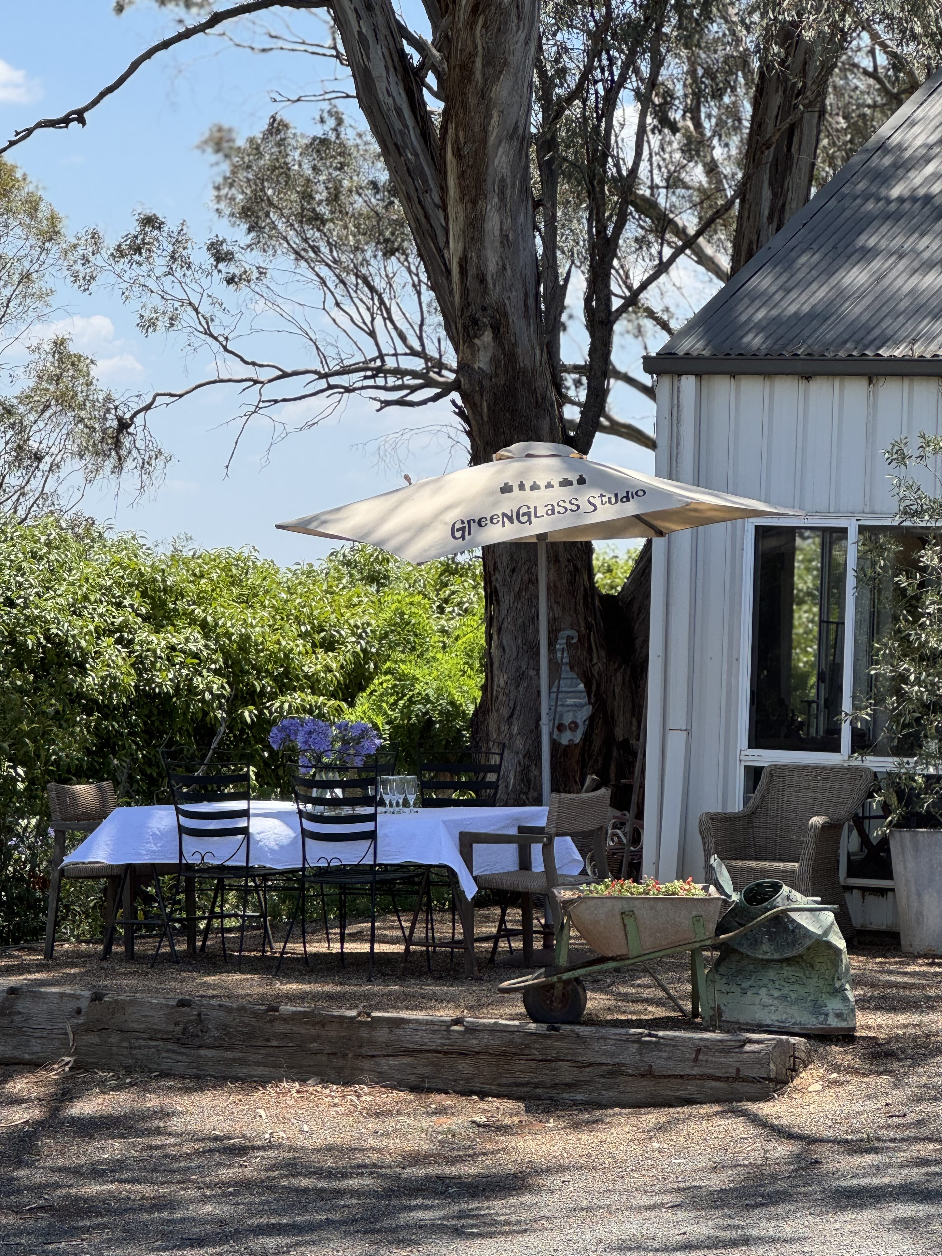 Green-Glass-Studio-with-table-jpg - Travellarks Green-Glass-Studio-with-table-Young-NSW-Travellarks-photo-Camilla-Duffy
