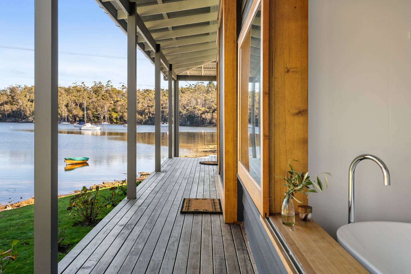 questabrunyislandinteriordecktravellarksaccommodation Travellarks Getaways questa bruny island interior deck travellarks accommodation