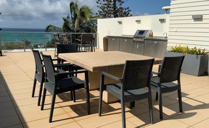 BBQ and spacious balcony with dining at setting at Jemingars Place, Rainbow Beach QLD accommodation